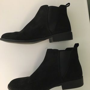 Black Chelsea-style booties